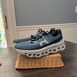 On Running Blue and White Athletic Shoes